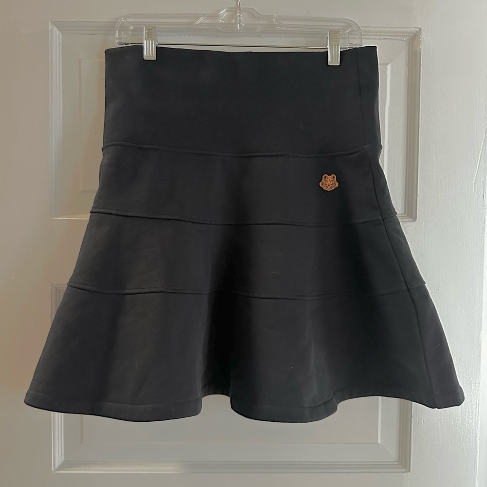Kenzo Paris black flared mini skirt. Tiger emblem patch. Fleece lined.